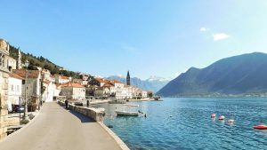 Perast with its promenade and palaces in the background